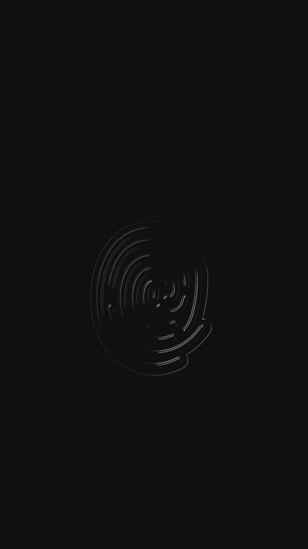 Rainbow spiral enamel pin with glowing “Queer” lettering displayed against a black background.